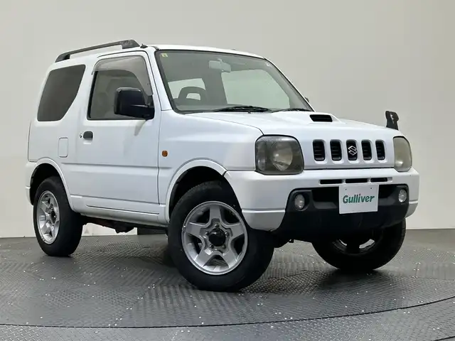 スズキ ジムニー XC 愛媛県 2001(平13)年 16万km スペリアホワイト ・オーディオ（ＣＤ・ＢＴ・ＵＳＢ・ＡＵＸ）/・４ＷＤ・２ＷＤ切り替え　/・ターボ/・5MT