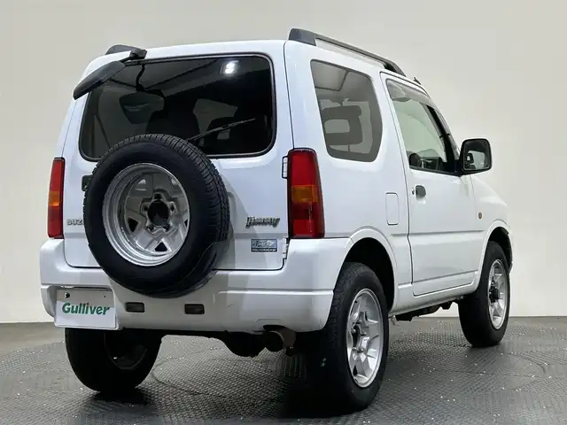 スズキ ジムニー XC 愛媛県 2001(平13)年 16万km スペリアホワイト ・オーディオ（ＣＤ・ＢＴ・ＵＳＢ・ＡＵＸ）/・４ＷＤ・２ＷＤ切り替え　/・ターボ/・5MT