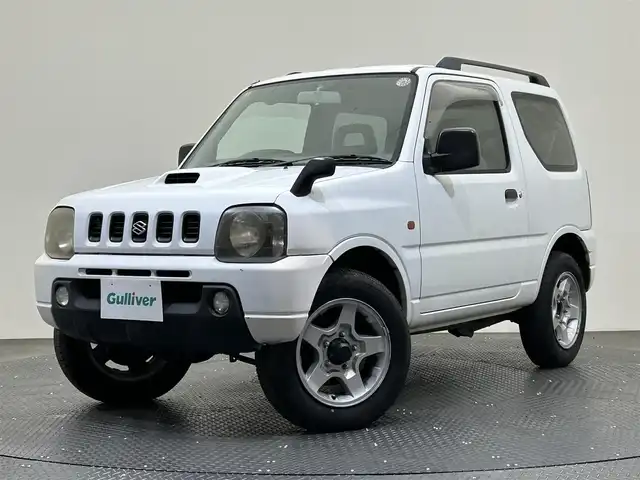 スズキ ジムニー XC 愛媛県 2001(平13)年 16万km スペリアホワイト ・オーディオ（ＣＤ・ＢＴ・ＵＳＢ・ＡＵＸ）/・４ＷＤ・２ＷＤ切り替え　/・ターボ/・5MT