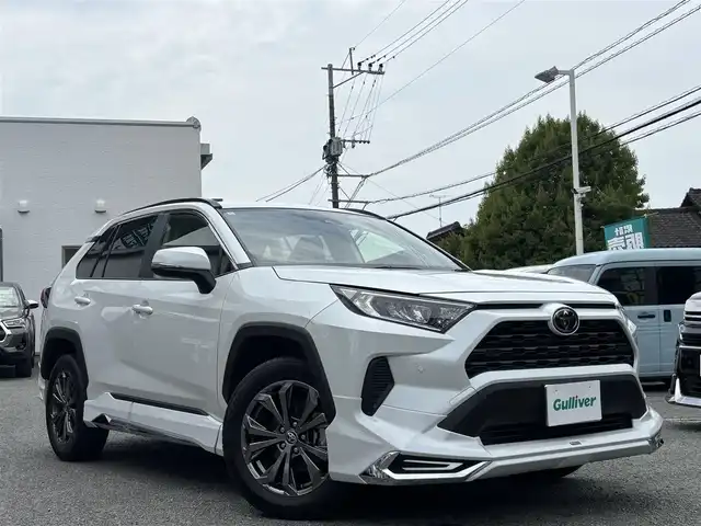 トヨタ ＲＡＶ４ X 熊本県 2024(令6)年 0.5万km プラチナホワイトパールマイカ ワンオーナー/モデリスタフルエアロ/ルーフレール/純正ディスプレイオーディオ(ナビ機能付き)/【フルセグTV/Bluetooth/USB】/衝突被害軽減システム/レーダークルーズコントロール/レーンキープアシスト/車両接近通報装置/コーナーセンサー/純正18インチアルミホイール/オートLEDライト/オートマチックハイビーム/ビルトインETC2.0/横滑り防止装置/盗難防止装置/純正フロアマット/ダブル＋サイドエアバック/プッシュスタート/スマートキー/スペアキー/取扱説明書/保証書