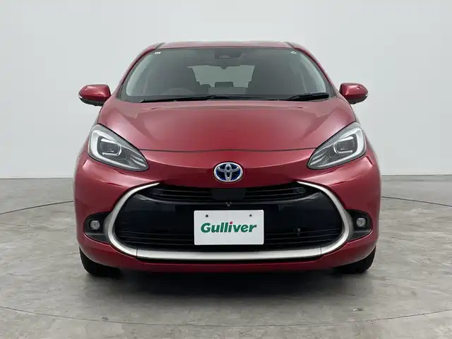 トヨタ アクア Z 三重県 2023(令5)年 1万km エモーショナルレッドⅡ 禁煙車/純正10.5インチディスプレイオーディオ/・USB/Bluetooth/AM/FM/AppleCarPray/AndroidAuto/パノラミックビューモニター/トヨタセーフティセンス/・ブラインドスポットモニター/・レーンディパーチャーアラート/・プリクラッシュセーフティ/・クリアランスソナー/・ロードサインアシスト/・パーキングサポートブレーキ/・リアクロストラフィックアラート/レーダークルーズコントロール/純正ビルトインETC/AC100V/オートライト/オートマチックハイビーム/ステアリングスイッチ/プッシュスタート/ウィンカーミラー/電動格納ミラー/純正フロアマット/純正15インチアルミホイール