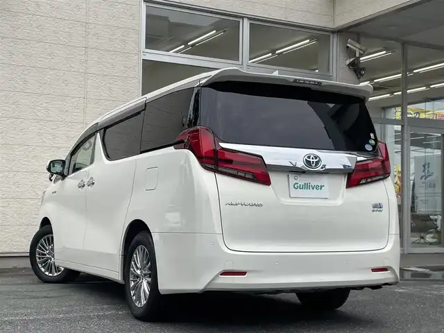 トヨタ アルファードハイブリット G Fパッケージ 埼玉県 2019(令1)年 15.1万km ラグジュアリーホワイトパールクリスタルシャインガラスフレーク /ワンオーナー//4WD//純10.5型メモリナビ//フルセグTV//バックカメラ//フリップダウンモニター//CD/DVD/Bluetooth//ベージュレザーシート//前2席パワーシート&エアシート//前2席&2列目シートヒーター//両側パワースライドドア//パワーバックドア//アダプティブクルーズコントロール//ビルトインETC2.0//スマートキーx2//LEDヘッドライト//デジタルインナーミラー//助手席&2列目オットマン//ステアリングヒーター//PCS 衝突軽減ブレーキ//LTA 車線逸脱抑制機能//ブラインドスポットモニター//パーキングサポートブレーキ//ロードサインアシスト//クリアランスソナー//W.サイド.カーテン.ニーエアバッグ//ABS/横滑り防止装置//コンビステアリング//オートライト/オートハイビーム//ドライブレコーダー(SDカード欠)//前後フォグランプ//プライバシーガラス//ドアバイザー//純正17インチAW//新車時保証書//取扱説明書//ナビ取説