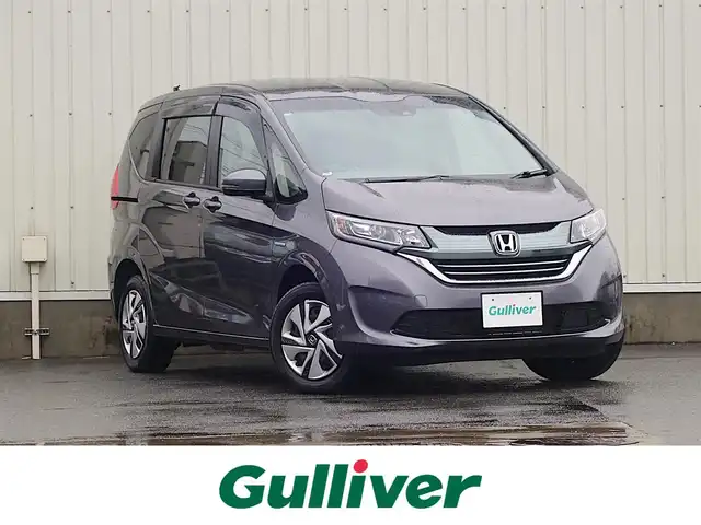 ホンダ フリード ハイブリット G ホンダセンシング 山形県 2018(平30)年 1.6万km モダンスティールM 4WD/ホンダセンシング/メモリナビ/　　【CD ワンセグ USB AUX】/バックカメラ/両側パワースライドドア/レーダークルーズコントロール/LEDオートライト/シートヒーター/ドライブレコーダー/アイドリングストップ/ステアリングスイッチ/電動格納ウィンカーミラー/スマートキー×2/ETC