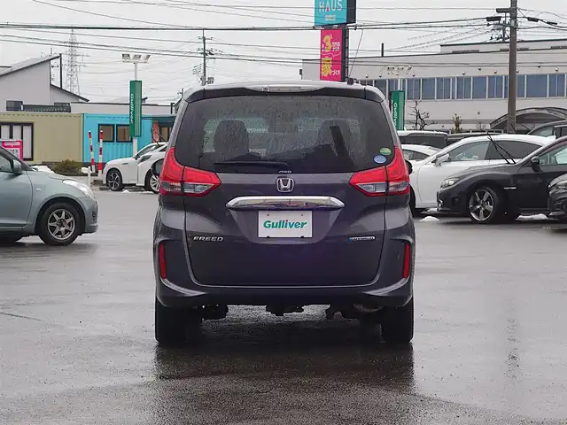 ホンダ フリード ハイブリット G ホンダセンシング 山形県 2018(平30)年 1.6万km モダンスティールM 4WD/ホンダセンシング/メモリナビ/　　【CD ワンセグ USB AUX】/バックカメラ/両側パワースライドドア/レーダークルーズコントロール/LEDオートライト/シートヒーター/ドライブレコーダー/アイドリングストップ/ステアリングスイッチ/電動格納ウィンカーミラー/スマートキー×2/ETC