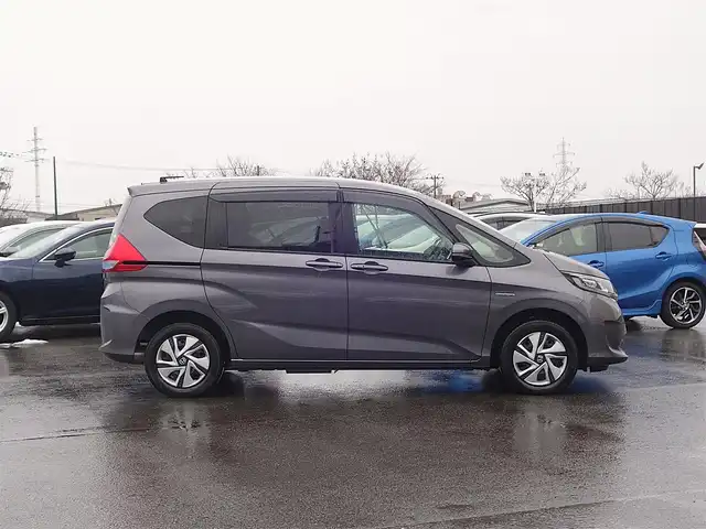 ホンダ フリード ハイブリット G ホンダセンシング 山形県 2018(平30)年 1.6万km モダンスティールM 4WD/ホンダセンシング/メモリナビ/　　【CD ワンセグ USB AUX】/バックカメラ/両側パワースライドドア/レーダークルーズコントロール/LEDオートライト/シートヒーター/ドライブレコーダー/アイドリングストップ/ステアリングスイッチ/電動格納ウィンカーミラー/スマートキー×2/ETC