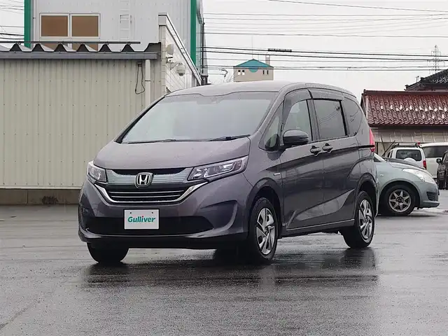 ホンダ フリード ハイブリット G ホンダセンシング 山形県 2018(平30)年 1.6万km モダンスティールM 4WD/ホンダセンシング/メモリナビ/　　【CD ワンセグ USB AUX】/バックカメラ/両側パワースライドドア/レーダークルーズコントロール/LEDオートライト/シートヒーター/ドライブレコーダー/アイドリングストップ/ステアリングスイッチ/電動格納ウィンカーミラー/スマートキー×2/ETC