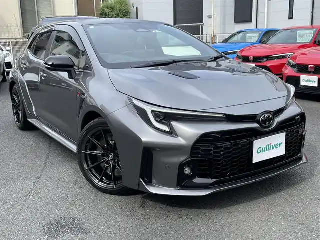 トヨタ ＧＲカローラ RZ 神奈川県 2024(令6)年 0.2万km グレー ワンオーナー/GRリヤスポイラー/カーボンルーフ/BBS製純正18インチAW/GR赤ブレーキキャリパー/JBLスピーカー/HUD/純正10.5インチディスプレイ/純正メモリーナビ・地デジTV/純正USB/BT/Miracast/バックモニター/ビルトインETC2.0/前後ドライブレコーダー/ハーフレザーシート/前席シートヒーター/ステアリングヒーター/トヨタセーフティセンス/レーダークルーズコントロール/PCS/LDA/BSM/RCTA/SEA/RSA/オートハイビーム/コーナーセンサー/寒冷地仕様/プッシュスタート/スマートキー×2/純正フロアマット/保証書・取説あり