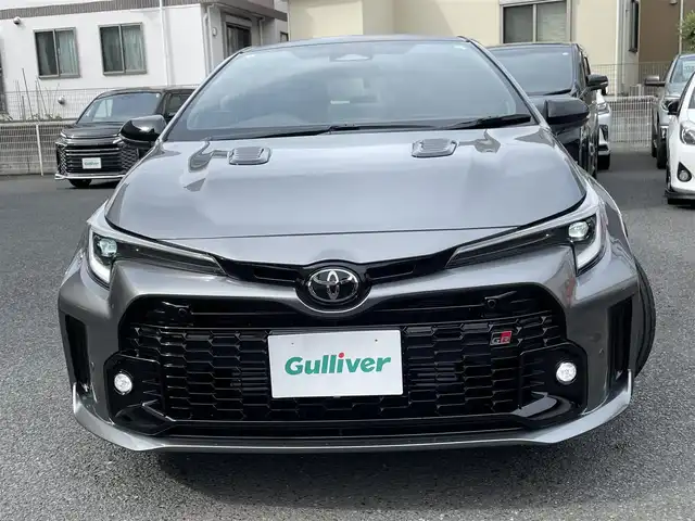 トヨタ ＧＲカローラ RZ 神奈川県 2024(令6)年 0.2万km グレー ワンオーナー/GRリヤスポイラー/カーボンルーフ/BBS製純正18インチAW/GR赤ブレーキキャリパー/JBLスピーカー/HUD/純正10.5インチディスプレイ/純正メモリーナビ・地デジTV/純正USB/BT/Miracast/バックモニター/ビルトインETC2.0/前後ドライブレコーダー/ハーフレザーシート/前席シートヒーター/ステアリングヒーター/トヨタセーフティセンス/レーダークルーズコントロール/PCS/LDA/BSM/RCTA/SEA/RSA/オートハイビーム/コーナーセンサー/寒冷地仕様/プッシュスタート/スマートキー×2/純正フロアマット/保証書・取説あり