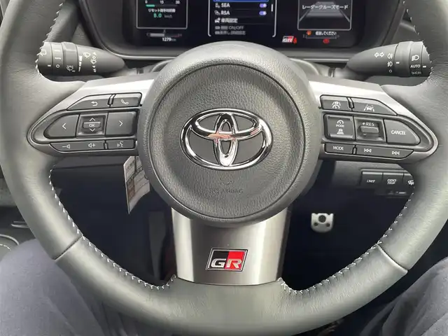 トヨタ ＧＲカローラ RZ 神奈川県 2024(令6)年 0.2万km グレー ワンオーナー/GRリヤスポイラー/カーボンルーフ/BBS製純正18インチAW/GR赤ブレーキキャリパー/JBLスピーカー/HUD/純正10.5インチディスプレイ/純正メモリーナビ・地デジTV/純正USB/BT/Miracast/バックモニター/ビルトインETC2.0/前後ドライブレコーダー/ハーフレザーシート/前席シートヒーター/ステアリングヒーター/トヨタセーフティセンス/レーダークルーズコントロール/PCS/LDA/BSM/RCTA/SEA/RSA/オートハイビーム/コーナーセンサー/寒冷地仕様/プッシュスタート/スマートキー×2/純正フロアマット/保証書・取説あり