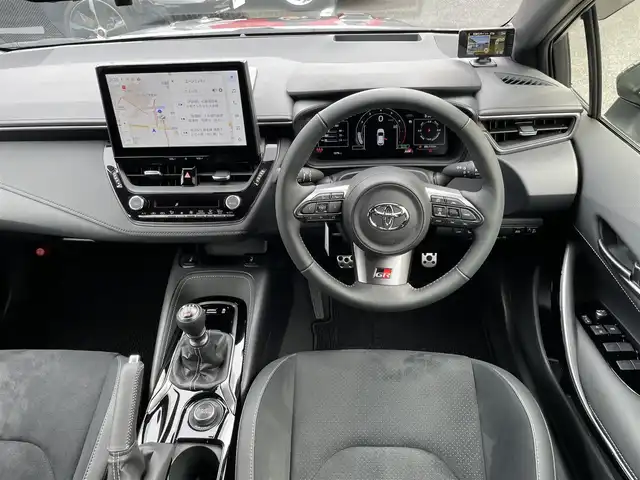 トヨタ ＧＲカローラ RZ 神奈川県 2024(令6)年 0.2万km グレー ワンオーナー/GRリヤスポイラー/カーボンルーフ/BBS製純正18インチAW/GR赤ブレーキキャリパー/JBLスピーカー/HUD/純正10.5インチディスプレイ/純正メモリーナビ・地デジTV/純正USB/BT/Miracast/バックモニター/ビルトインETC2.0/前後ドライブレコーダー/ハーフレザーシート/前席シートヒーター/ステアリングヒーター/トヨタセーフティセンス/レーダークルーズコントロール/PCS/LDA/BSM/RCTA/SEA/RSA/オートハイビーム/コーナーセンサー/寒冷地仕様/プッシュスタート/スマートキー×2/純正フロアマット/保証書・取説あり