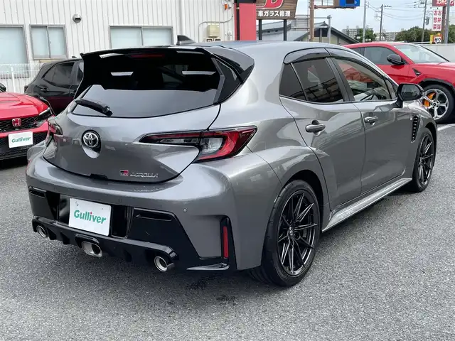 トヨタ ＧＲカローラ RZ 神奈川県 2024(令6)年 0.2万km グレー ワンオーナー/GRリヤスポイラー/カーボンルーフ/BBS製純正18インチAW/GR赤ブレーキキャリパー/JBLスピーカー/HUD/純正10.5インチディスプレイ/純正メモリーナビ・地デジTV/純正USB/BT/Miracast/バックモニター/ビルトインETC2.0/前後ドライブレコーダー/ハーフレザーシート/前席シートヒーター/ステアリングヒーター/トヨタセーフティセンス/レーダークルーズコントロール/PCS/LDA/BSM/RCTA/SEA/RSA/オートハイビーム/コーナーセンサー/寒冷地仕様/プッシュスタート/スマートキー×2/純正フロアマット/保証書・取説あり