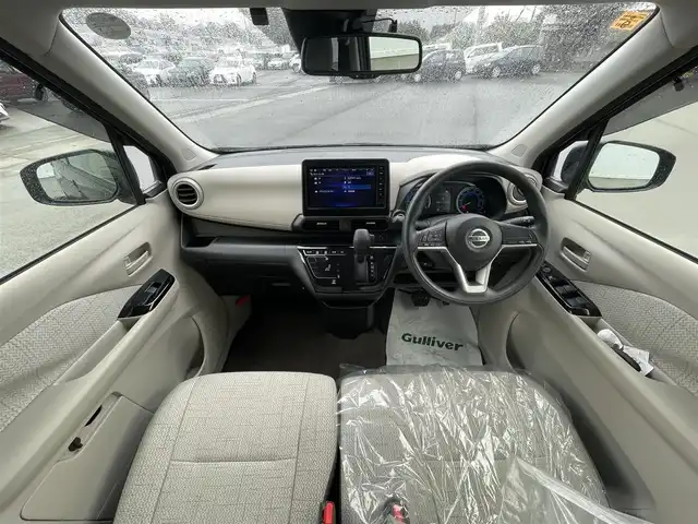 日産 デイズ X 愛媛県 2023(令5)年 0.2万km アッシュブラウンM 純正9インチナビ(Bluetooth)/バックカメラ/フルセグテレビ/ETC/前後ドライブレコーダー/アイドリングストップ/ダウンヒルアシストコントロール/前後コーナーセンサー/オートライト/オートマチックハイビーム/純正フロアマット/純正ドアバイザー/純正アルミホイール/横滑り防止装置/衝突被害軽減システム/スマートキー/プッシュスタート/ABS