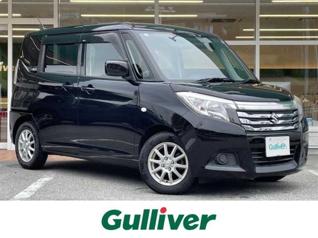 スズキ ソリオ G 岐阜県 2016(平28)年 9.1万km スーパーブラックパール 社外SDナビ/Bluetooth/バックカメラ/前席シートヒーター/片側パワースライドドア/デュアルカメラブレーキサポート/誤発進抑制装置/先行車発進おしらせ機能/ふらつき防止/純正フロアマット/ドアバイザー/LEDライト