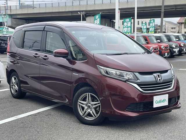 ホンダ フリード ハイブリット G ホンダセンシング 石川県 2017(平29)年 6万km プレミアムディープロッソパール 純正メモリーナビ/CD/DVD/フルセグTV/バックカメラ/LEDヘッドライト/ビルトインETC/両側パワースライド/ホンダセンシング/レーダークルーズ/ドライブレコーダー/社外アルミホイール/スマートキー/プッシュスタート/電動ミラー/保証書