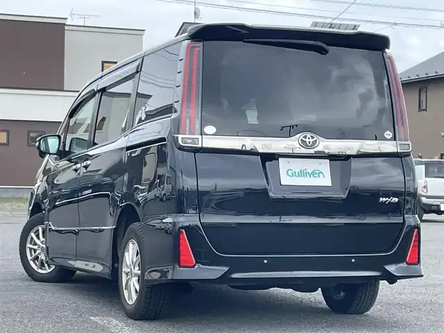 トヨタ ノア Si ダブルバイビーⅡ 道央・札幌 2020(令2)年 5.1万km ブラック ４WD/寒冷地仕様/社外SDナビ/CD/DVD/BT/フルセグ/純正フリップダウンモニター/プリクラッシュセーフティ/横滑り防止装置/クルーズコントロール/クリアランスソナー/バックカメラ/ドライブレコーダー/アイドリングストップ/ワイパーデアイサー/両側パワースライドドア/ハーフレザーシート/ステアリングリモコン/プッシュスタート/スマートキー/LEDヘッドライト/オートライト/電動格納ミラー/ウィンカーミラー/純正フロアマット/ドアバイザー/スペアキー/純正AW付夏タイヤ積込/195/65/R15/2020年/山2mm