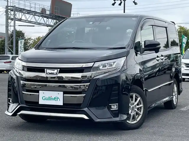 トヨタ ノア Si ダブルバイビーⅡ 道央・札幌 2020(令2)年 5.1万km ブラック ４WD/寒冷地仕様/社外SDナビ/CD/DVD/BT/フルセグ/純正フリップダウンモニター/プリクラッシュセーフティ/横滑り防止装置/クルーズコントロール/クリアランスソナー/バックカメラ/ドライブレコーダー/アイドリングストップ/ワイパーデアイサー/両側パワースライドドア/ハーフレザーシート/ステアリングリモコン/プッシュスタート/スマートキー/LEDヘッドライト/オートライト/電動格納ミラー/ウィンカーミラー/純正フロアマット/ドアバイザー/スペアキー/純正AW付夏タイヤ積込/195/65/R15/2020年/山2mm