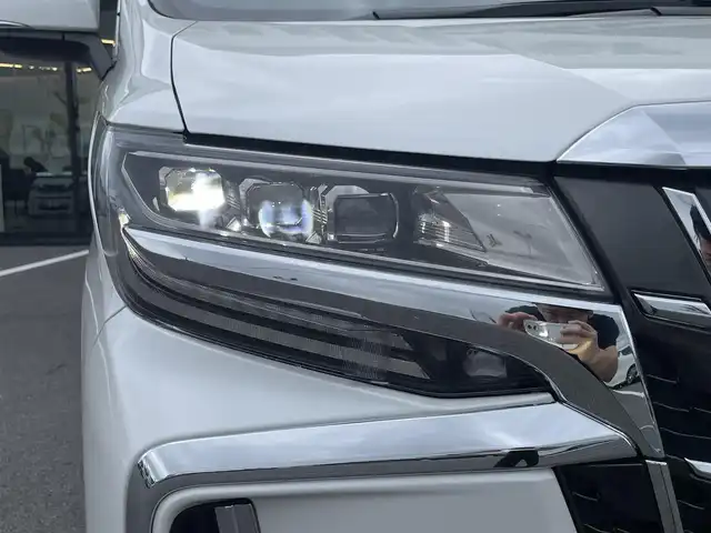トヨタ アルファード S Cパッケージ 愛媛県 2021(令3)年 3.2万km ホワイトパールクリスタルシャイン 純正ディスプレイオーディオ（Bluetooth/フルセグTV）/CD/DVDデッキ/両側パワースライドドア/三眼LEDヘッドライト/純正12型フリップダウンモニター/レーダークルーズコントロール/黒レザーシート/シートヒーター/シートベンチレーション/ビルトインETC2.0/前後ドライブレコーダー/オットマン/ステアリングヒーター/シートメモリ/純正フロアマット/パワーバックドア/前後コーナーセンサー/パワーバックドア