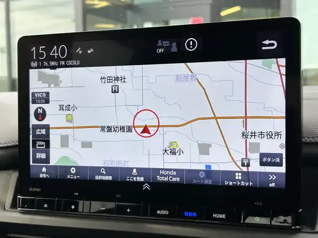 ホンダ ステップワゴン スパーダ eHEV 奈良県 2023(令5)年 1.8万km クリスタルブラックパール Gathers11.4インチナビ(フルセグTV/CD/DVD/AM・FM/BT/USB/HDMI)/ETC/Honda　SENSING/両側パワースライドドア/アラウンドビューモニター/パドルシフト/シートヒーター(D/N席)/2列目キャプテンシート/オットマン/パワーテールゲート/純正16インチアルミホイール(ベルリナブラック＋ダーク切削クリア)/LEDヘッドライト(シーケンシャルウインカー)/フォグランプ/LEDアクティブコーナリングライト/全席USBチャージャー(Type-C)/本革ステアリングホイール/純正フロアマット/スペアキー