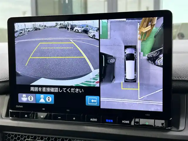 ホンダ ステップワゴン スパーダ eHEV 奈良県 2023(令5)年 1.8万km クリスタルブラックパール Gathers11.4インチナビ(フルセグTV/CD/DVD/AM・FM/BT/USB/HDMI)/ETC/Honda　SENSING/両側パワースライドドア/アラウンドビューモニター/パドルシフト/シートヒーター(D/N席)/2列目キャプテンシート/オットマン/パワーテールゲート/純正16インチアルミホイール(ベルリナブラック＋ダーク切削クリア)/LEDヘッドライト(シーケンシャルウインカー)/フォグランプ/LEDアクティブコーナリングライト/全席USBチャージャー(Type-C)/本革ステアリングホイール/純正フロアマット/スペアキー