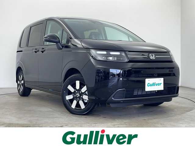 ホンダ フリード ハイブリット e:HEV AIR EX 秋田県 2025(令7)年 0.1万km未満 クリスタルブラックパール ４WD/ワンオーナー　/両側パワースライドドア　/ＬＥＤヘッドライト　/ブラインドスポットモニター　/前席シートヒーター　/レーダークルーズコントロール　/オートライト　/オートエアコン /自動パーキングブレーキ/ブレーキホールド/USBポート/ホンダECON/ハーフレザーシート /革巻きステアリング/ステアリングリモコン装着車両/バックカメラ装着車両/電格ミラー/横滑り防止装置/衝突被害軽減システム/レーン逸脱警報/フロントワイパーデアイサー /純正AW/ウィンカーミラー /コーナーセンサー