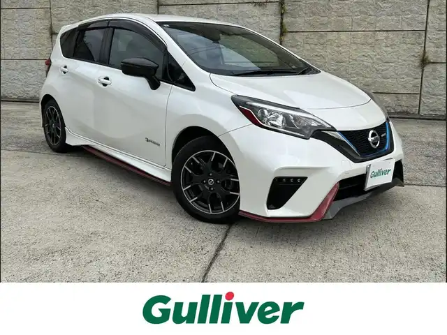 日産 ノート e－パワー ニスモ 長崎県 2017(平29)年 7.1万km ブリリアントホワイトパール 純正メモリナビ/（CD/BD/BT/フルセグ）/バックカメラ/衝突軽減システム/レーンアシスト/オートライト/ETC/スマートキー/プッシュスタート/電動格納ミラー/純正16インチAW