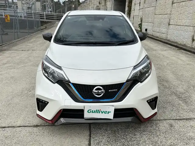 日産 ノート e－パワー ニスモ 長崎県 2017(平29)年 7.1万km ブリリアントホワイトパール 純正メモリナビ/（CD/BD/BT/フルセグ）/バックカメラ/衝突軽減システム/レーンアシスト/オートライト/ETC/スマートキー/プッシュスタート/電動格納ミラー/純正16インチAW
