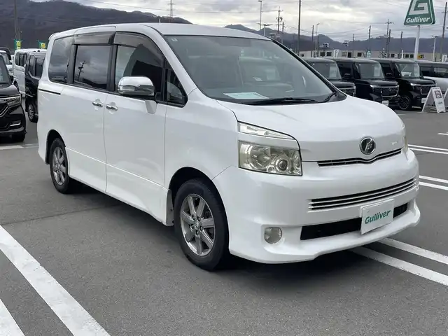 トヨタ ヴォクシー ZS 煌Ⅱ 長野県 2010(平22)年 14.1万km ホワイトパールクリスタルシャイン ４ＷＤ/純正HDDナビ/ＣＤ・ＤＶＤ再生/フルセグＴＶ/Bluetooth Audio/バックカメラ/両側パワースライドドア/HIDライト/オートライト/スマートキーx2/プッシュスタート/ＥＴＣ/ウィンカードアミラー/純正16インチアルミ