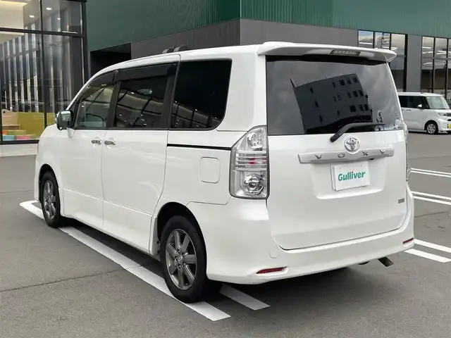 トヨタ ヴォクシー ZS 煌Ⅱ 長野県 2010(平22)年 14.1万km ホワイトパールクリスタルシャイン ４ＷＤ/純正HDDナビ/ＣＤ・ＤＶＤ再生/フルセグＴＶ/Bluetooth Audio/バックカメラ/両側パワースライドドア/HIDライト/オートライト/スマートキーx2/プッシュスタート/ＥＴＣ/ウィンカードアミラー/純正16インチアルミ