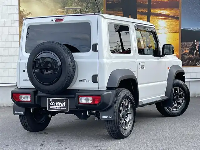 スズキ ジムニー シエラ JC 愛知県 2023(令5)年 1.1万km ピュアホワイトP AIS検査済み/社外CDオーディオ/クルーズコントロール/スズキセーフティー/SUZUKIグリル/スマートキー/オートライト/マッドフラップ/純正フロアマット/ETC