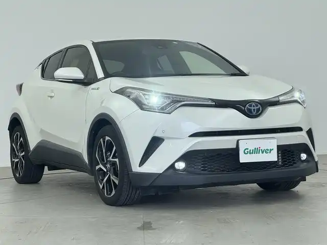トヨタ Ｃ－ＨＲ G 愛知県 2018(平30)年 8.2万km ホワイトパールクリスタルシャイン 純正９インチナビ　/（フルセグ／ＢＴ／ＣＤ／ＤＶＤ）　/レーダークルーズコントロール　/バックモニター　/ブラインドスポットモニター　/衝突軽減システム /コーナーセンサー　/レーンキープアシスト　/ハーフレザーシート（ブラック）/前席シートヒーター　/ドライブレコーダー /ETC /純正AW