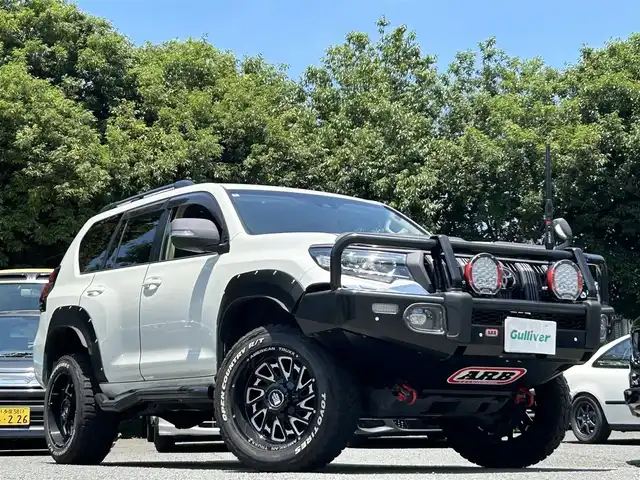 トヨタ ランドクルーザー プラド TX Lパッケージ 東京都 2020(令2)年 5.7万km ホワイトパールクリスタルシャイン アルパイン製9インチナビ/Bluetooothオーディオ/フルセグTV/DVD再生/ビルトインETC/ルーフレール(黒)/・・・・・・・・・・・・・・・・・・・・・・・/構造変更申請済み/全長503cm×全幅200cm×全高198cm/・・・・・・・・・・・・・・・・・・・・・・・/BLITZ製車高調/DAMPER ZZ-R/LIFT UPモデル/ARB INTENSITY SOLIS(LEDフォグランプ)/ARB GMEアンテナ/ARB グリルガード一体型バンパー/JAOSマッドガード/KADDISサイドステップ/KADDISフューエルリッドプロテクター/ガナドールマフラー/ボンネットプロテクター/オーバーフェンダー/IPFバックランプ600