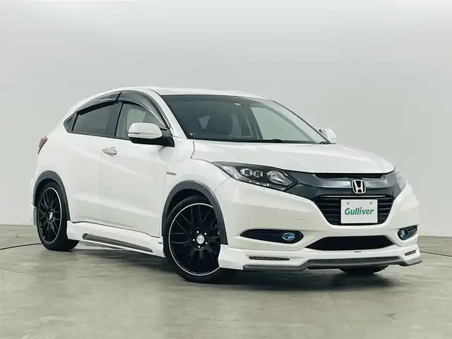 ホンダ ヴェゼル ハイブリッド X 福島県 2016(平28)年 6万km ホワイトオーキッドパール ＡＬＰＩＮＥスタイル　/・ＡＬＰＩＮＥフルエアロ　/・ＡＬＰＩＮＥナビ　/・ＡＬＰＩＮＥ後席モニター　/・ＡＬＰＩＮＥウーハー/・ＡＬＰＩＮＥシートカバー　/・ＡＬＰＩＮＥウッドコンビステアリング/クルーズコントロール　/車高調　/バックカメラ/電子パーキング/・ブレーキホールド/ステアリングスイッチ/プッシュスタート/・スマートキー/LEDライト/・オートライト/・フォグライト/バイザー/フロアマット