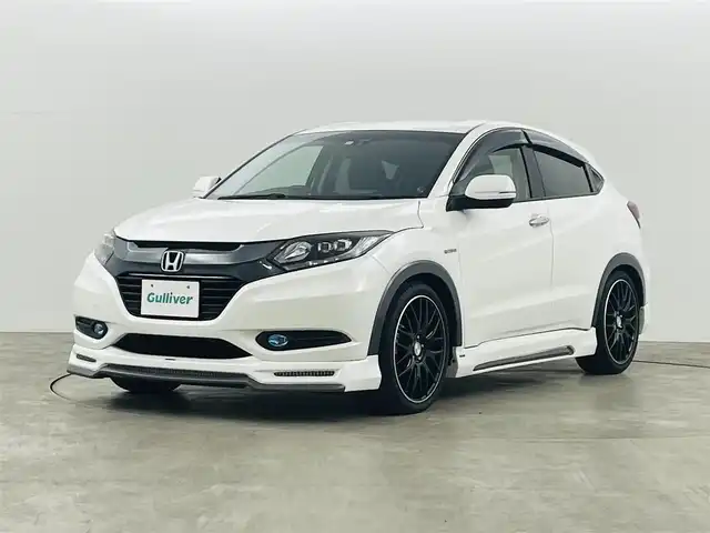 ホンダ ヴェゼル ハイブリッド X 福島県 2016(平28)年 6万km ホワイトオーキッドパール ＡＬＰＩＮＥスタイル　/・ＡＬＰＩＮＥフルエアロ　/・ＡＬＰＩＮＥナビ　/・ＡＬＰＩＮＥ後席モニター　/・ＡＬＰＩＮＥウーハー/・ＡＬＰＩＮＥシートカバー　/・ＡＬＰＩＮＥウッドコンビステアリング/クルーズコントロール　/車高調　/バックカメラ/電子パーキング/・ブレーキホールド/ステアリングスイッチ/プッシュスタート/・スマートキー/LEDライト/・オートライト/・フォグライト/バイザー/フロアマット