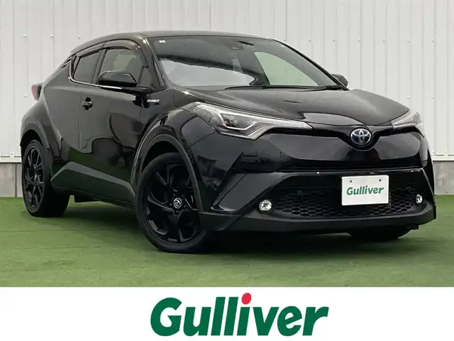 トヨタ Ｃ－ＨＲ G モード ネロ 香川県 2019(平31)年 5.6万km ブラックマイカ 登録時走行距離：55714km/純正SDナビゲーション/【AM/FM/フルセグ/Bluetooth/HDMI/CD/DVD】/トヨタセーフティセンス/→プリクラッシュセーフティシステム/→LDA（レーンディパーチャーアラート）/→レーダークルーズコントロール/→AHB（オートハイビーム）/シートヒーター（前席）/コーナーセンサー（前後）/ビルトインETC/LEDオートライト/LEDフォグランプ/オートホールド付きブレーキ/ドライブレコーダー/純正18インチアルミホイール/純正フロアマット/スペアキー/スマートキー/プッシュスタート