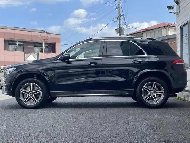 メルセデス・ベンツ ＧＬＥ４５０ 4MATIC スポーツ 福岡県 2021(令3)年 8万km オブシディアンブラック 4WD/ターボ/7人乗り/パノラミックスライディングルーフ/Burmesterサウンド/純正12.3インチナビ/　(AM/FM/Bluetooth/フルセグTV)/360°ビューカメラ/バック/サイド/フロントカメラ/レーダーセーフティパッケージ/・ブレーキアシスト/・ブラインドスポットアシスト/・レーンキーピングアシスト/・レーンチェンジアシスト/・道路標識アシスト/・アテンションアシスト/・ディスタンスアシストディストロニック/・ステアリングアシスト/アダプティブハイビームアシストプラス/バックソナー/純正20インチアルミホイール/パワーバックドア/ルーフレール/レベルコントロール/ビルトインETC2.0/ヘッドアップディスプレイ/パドルシフト/黒レザーシート/パワーシート(1.2列目)/シートヒーター(1.2列目)/シートベンチレーション(D/N)/シートメモリー(D/N)/電動格納シート(2列目)/ワイヤレス充電/USB-Cポート/純正積載品(サンシェード、ワイパーブレード)/スペアキー×1/ISOFIX/保証書/取扱説明書