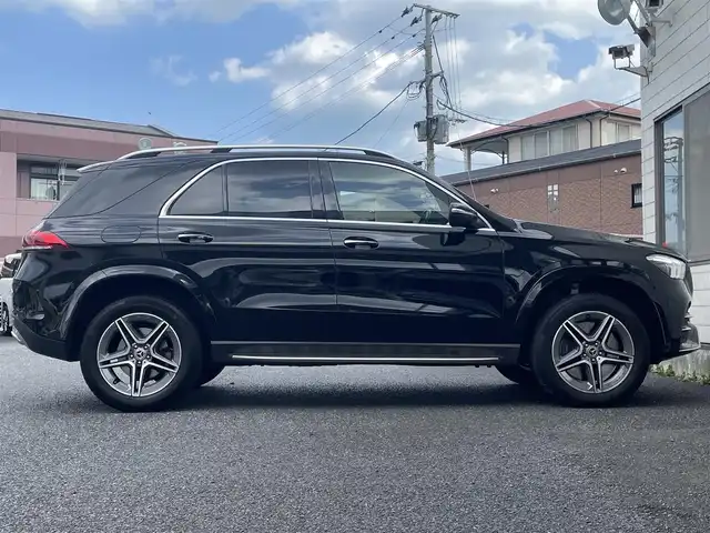 メルセデス・ベンツ ＧＬＥ４５０ 4MATIC スポーツ 福岡県 2021(令3)年 8万km オブシディアンブラック 4WD/ターボ/7人乗り/パノラミックスライディングルーフ/Burmesterサウンド/純正12.3インチナビ/　(AM/FM/Bluetooth/フルセグTV)/360°ビューカメラ/バック/サイド/フロントカメラ/レーダーセーフティパッケージ/・ブレーキアシスト/・ブラインドスポットアシスト/・レーンキーピングアシスト/・レーンチェンジアシスト/・道路標識アシスト/・アテンションアシスト/・ディスタンスアシストディストロニック/・ステアリングアシスト/アダプティブハイビームアシストプラス/バックソナー/純正20インチアルミホイール/パワーバックドア/ルーフレール/レベルコントロール/ビルトインETC2.0/ヘッドアップディスプレイ/パドルシフト/黒レザーシート/パワーシート(1.2列目)/シートヒーター(1.2列目)/シートベンチレーション(D/N)/シートメモリー(D/N)/電動格納シート(2列目)/ワイヤレス充電/USB-Cポート/純正積載品(サンシェード、ワイパーブレード)/スペアキー×1/ISOFIX/保証書/取扱説明書