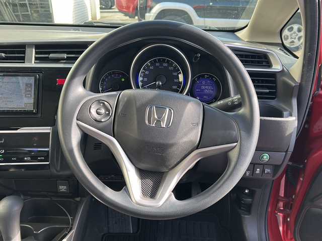 ホンダ フィット 13G FパックコンフォートED 富山県 2016(平28)年 6.4万km プレミアムクリスタルレッドM 社外ナビ/Bluetooth、DVD、CD、フルセグTV/バックカメラ/ABS/横滑り防止装置/盗難防止装置/純正フロアマット/スマートキー/スペアキー/プッシュスタート/ETC/冬タイヤ車載/取扱説明書/保証書/ワンオーナー/記録簿