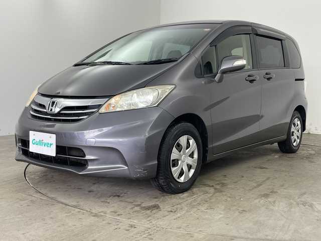 ホンダ フリード G ジャストセレクション+ 兵庫県 2014(平26)年 2.3万km モダンスティールM ・ワンオーナー車/・純正ナビ（CD/DVD/TV/SD/BT)/・片側パワースライドドア/・ハーフレザーシート/・HIDヘッドライト/・ビルトインETC/・3列シート/・2列目外側アームレスト/・スマートキー/・バックカメラ/・オートライト