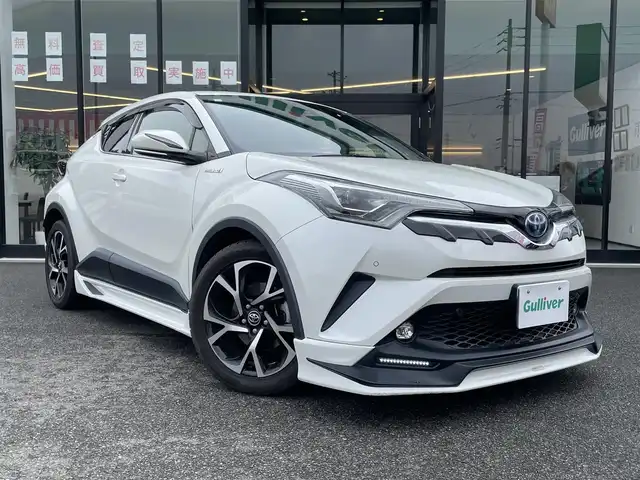 トヨタ Ｃ－ＨＲ G 兵庫県 2019(平31)年 9.8万km ホワイトパールクリスタルシャイン 禁煙車/純正９インチナビ/・Bluetooth・T-connect・SD/・CD/DVD・フルセグ・SD/プリクラッシュセーフティシステム/レーンキープアシスト/BSM/クリアランスソナー/レーダークルーズコントロール/オートライト/オートマチックハイビーム/TRDフルエアロ/電動パーキングブレーキ/ブレーキホールド/シートヒーターDN/ハーフレザーシート/LEDヘッドライト/前方ドラレコ/ビルドインETC/スマートキー/プッシュスタート