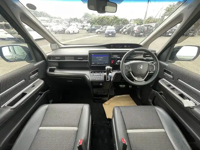 ホンダ ステップワゴン スパーダ クルスピセンシング 愛媛県 2017(平29)年 6.5万km プレミアムスパークルブラックパール 両側パワースライドドア/フリップダウンモニター/純正メモリナビ/CD/DVD/BT/MSV/iPod/フルセグTV/バックカメラ/ビルトインETC2.0/衝突被害軽減ブレーキ/レーンキープアシストシステム/アダプティブクルーズコントロール/ハーフレザーシート/D席＋N席シートヒーター/LEDヘッドライト/フォグライト/オートライト/純正フロアマット/後席サンシェード/純正16インチアルミホイール/スマートキー/プッシュスタート