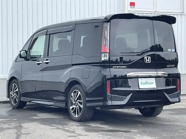 ホンダ ステップワゴン スパーダ クルスピセンシング 愛媛県 2017(平29)年 6.5万km プレミアムスパークルブラックパール 両側パワースライドドア/フリップダウンモニター/純正メモリナビ/CD/DVD/BT/MSV/iPod/フルセグTV/バックカメラ/ビルトインETC2.0/衝突被害軽減ブレーキ/レーンキープアシストシステム/アダプティブクルーズコントロール/ハーフレザーシート/D席＋N席シートヒーター/LEDヘッドライト/フォグライト/オートライト/純正フロアマット/後席サンシェード/純正16インチアルミホイール/スマートキー/プッシュスタート