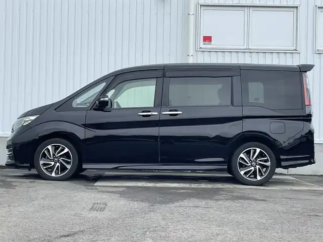 ホンダ ステップワゴン スパーダ クルスピセンシング 愛媛県 2017(平29)年 6.5万km プレミアムスパークルブラックパール 両側パワースライドドア/フリップダウンモニター/純正メモリナビ/CD/DVD/BT/MSV/iPod/フルセグTV/バックカメラ/ビルトインETC2.0/衝突被害軽減ブレーキ/レーンキープアシストシステム/アダプティブクルーズコントロール/ハーフレザーシート/D席＋N席シートヒーター/LEDヘッドライト/フォグライト/オートライト/純正フロアマット/後席サンシェード/純正16インチアルミホイール/スマートキー/プッシュスタート