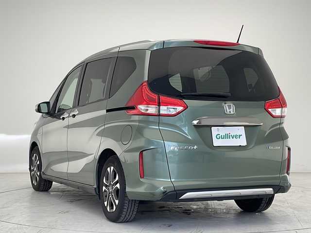 ホンダ フリード＋ ハイブリット クロスター ホンダセンシング 沖縄県 2022(令4)年 5.2万km シルバーミストグリーンM 純正ナビ　（VXM-224VFi）/（ＣＤ、ＤＶＤ、フルセグＴＶ、Ｂｌｕｅｔｏｏｔｈ）　/バックカメラ/ドライブレコーダー/ＥＴＣ/両側パワースライドドア/クルーズコントロール/ステアリングスイッチ/後方誤発進抑制機能/プッシュスタート/スマートキー/スペアキー/シートヒーター/ハーフレザーシート/純正フロアマット/純正15インチアルミホイール/保証書/取扱説明書