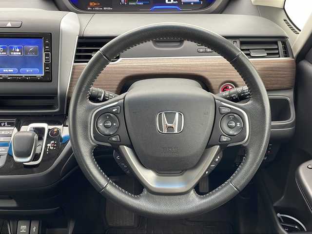 ホンダ フリード＋ ハイブリット クロスター ホンダセンシング 沖縄県 2022(令4)年 5.2万km シルバーミストグリーンM 純正ナビ　（VXM-224VFi）/（ＣＤ、ＤＶＤ、フルセグＴＶ、Ｂｌｕｅｔｏｏｔｈ）　/バックカメラ/ドライブレコーダー/ＥＴＣ/両側パワースライドドア/クルーズコントロール/ステアリングスイッチ/後方誤発進抑制機能/プッシュスタート/スマートキー/スペアキー/シートヒーター/ハーフレザーシート/純正フロアマット/純正15インチアルミホイール/保証書/取扱説明書