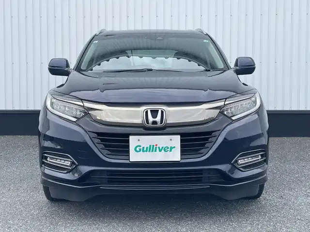ホンダ ヴェゼル ハイブリッド Z ホンダセンシング 千葉県 2019(令1)年 2.4万km ミッドナイトブルービームM 純正8インチナビ/(フルセグTV/BT/CD/DVD/FM/AM)/バックカメラ/衝突被害軽減システム/車線逸脱警報/レーダークルーズコントロール/ハーフレザーシート/横滑り防止装置/ビルトインETC/ドライブレコーダー/アイドリングストップ/LEDヘッドライト/フォグランプ/オートライト/ウィンカーミラー/電動格納ミラー/純正17インチAW/シートヒーター/シートリフター/パドルシフト/プッシュスタート/スマートキー/フロアマット/ドアバイザー/スペアキー/取扱説明書/保証書