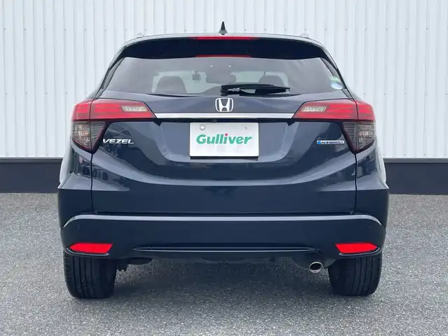 ホンダ ヴェゼル ハイブリッド Z ホンダセンシング 千葉県 2019(令1)年 2.4万km ミッドナイトブルービームM 純正8インチナビ/(フルセグTV/BT/CD/DVD/FM/AM)/バックカメラ/衝突被害軽減システム/車線逸脱警報/レーダークルーズコントロール/ハーフレザーシート/横滑り防止装置/ビルトインETC/ドライブレコーダー/アイドリングストップ/LEDヘッドライト/フォグランプ/オートライト/ウィンカーミラー/電動格納ミラー/純正17インチAW/シートヒーター/シートリフター/パドルシフト/プッシュスタート/スマートキー/フロアマット/ドアバイザー/スペアキー/取扱説明書/保証書