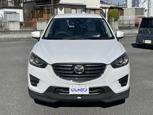 マツダ ＣＸ－５ XD Lパッケージ 山梨県 2015(平27)年 8.2万km クリスタルホワイトパールマイカ (株)IDOMが運営する【じしゃロン甲府店】の自社ローン専用車両になります。/こちらは現金またはオートローンご利用時の価格です。自社ローンご希望の方は別途その旨お申付け下さい/純正メモリーナビ/（フルセグTV/CD/DVD/BTオーディオ）/バックカメラ/ドライブレコーダー/レザーシート/前席パワーシート/前席シートヒーター/社外フロントエアロ/HIDヘッドライト/フォグランプ/オートライト/衝突被害軽減ブレーキ/横滑り防止装置/アイドリングストップ/新車時保証書/取扱説明書/ナビ取扱説明書