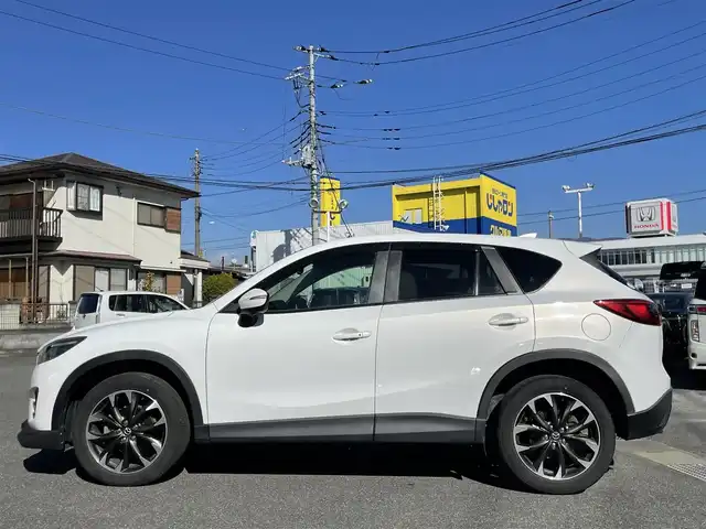 マツダ ＣＸ－５ XD Lパッケージ 山梨県 2015(平27)年 8.2万km クリスタルホワイトパールマイカ (株)IDOMが運営する【じしゃロン甲府店】の自社ローン専用車両になります。/こちらは現金またはオートローンご利用時の価格です。自社ローンご希望の方は別途その旨お申付け下さい/純正メモリーナビ/（フルセグTV/CD/DVD/BTオーディオ）/バックカメラ/ドライブレコーダー/レザーシート/前席パワーシート/前席シートヒーター/社外フロントエアロ/HIDヘッドライト/フォグランプ/オートライト/衝突被害軽減ブレーキ/横滑り防止装置/アイドリングストップ/新車時保証書/取扱説明書/ナビ取扱説明書
