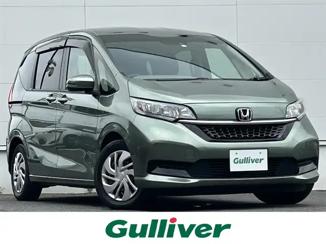 ホンダ フリード G ホンダセンシング 佐賀県 2020(令2)年 2.6万km シルバーミストグリーンM ワンオーナー/Gathersナビ/バックカメラ/両側パワースライドドア/ホンダセンシング/・衝突被害軽減システム/・車線逸脱警報機能/・アダプティブクルーズコントロール/・コーナーセンサー/ステアリングスイッチ/アイドリングストップ/ビルトインETC/スマートキー/プッシュスタート