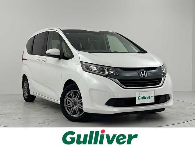 ホンダ フリード G ホンダセンシング 大阪府 2018(平30)年 3万km ホワイトオーキッドパール ホンダセンシング/純正ナビ/・BTオーディオ/DVD/CD/ワンセグ/バックカメラ/ビルトインETC/コンフォートビューパッケージ/両側電動スライド/ACC/LEDヘッドランプ/コーナリングライト/純正フロアマット/スマートキー/社外アルミホイール